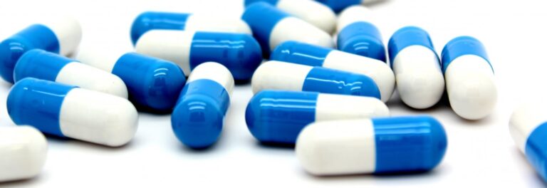 pexels photo 415825 blue white pills 768x264