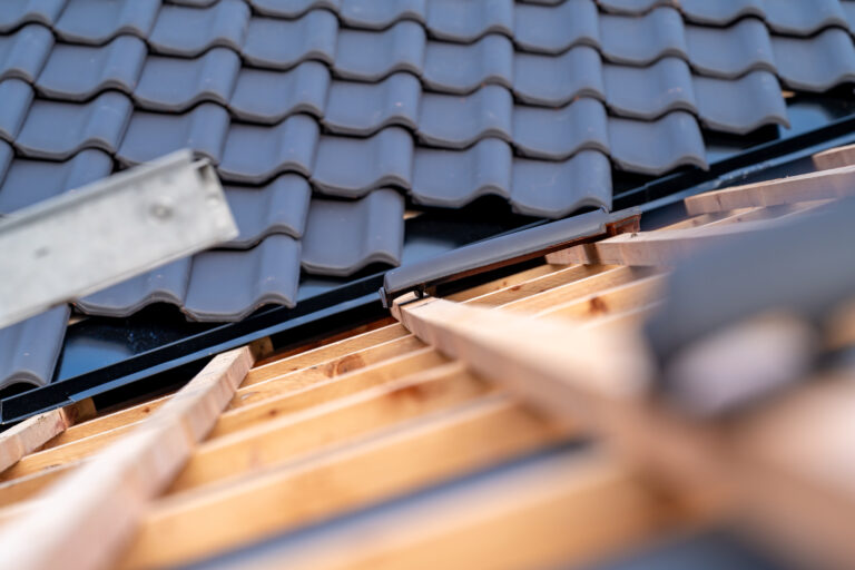 medium construction of the roof of a family house on wooden beams made of ceramic tiles 768x512