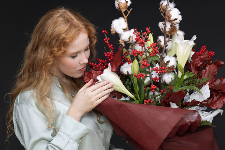 medium shot woman smelling flowers 768x512