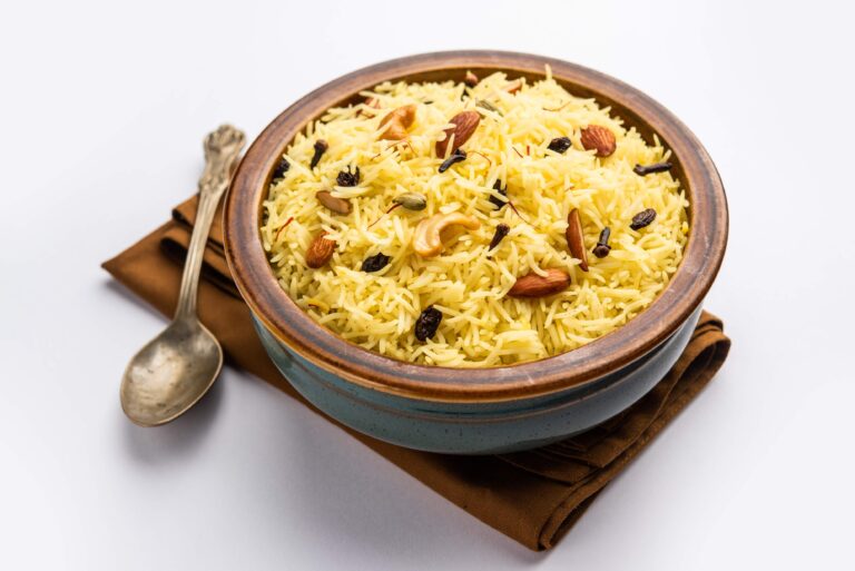 kashmiri sweet modur pulao made rice cooked with sugar water flavored with saffron dry fruits 768x513